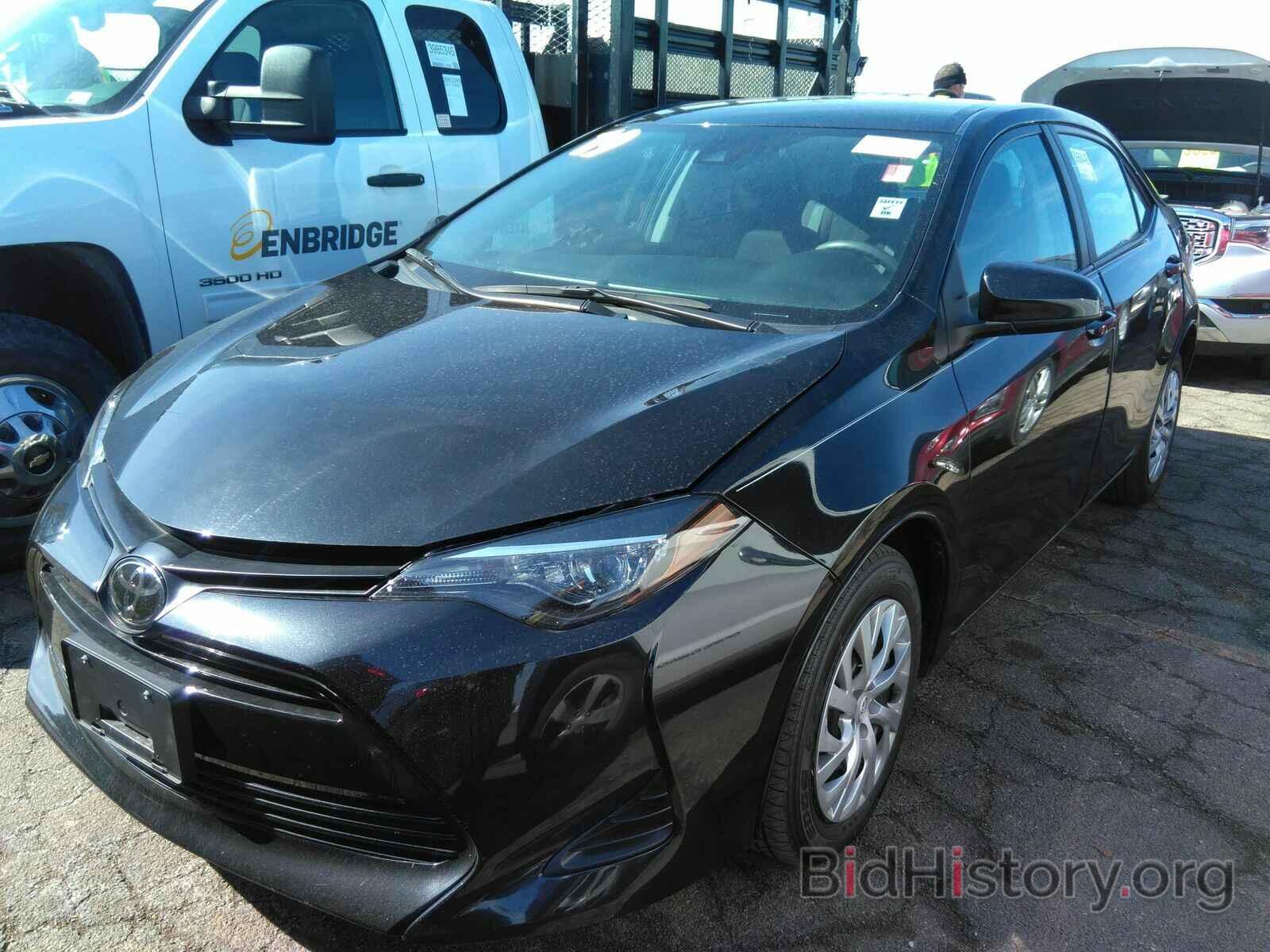 Фотография 5YFBURHE2KP915040 - Toyota Corolla LE 2019