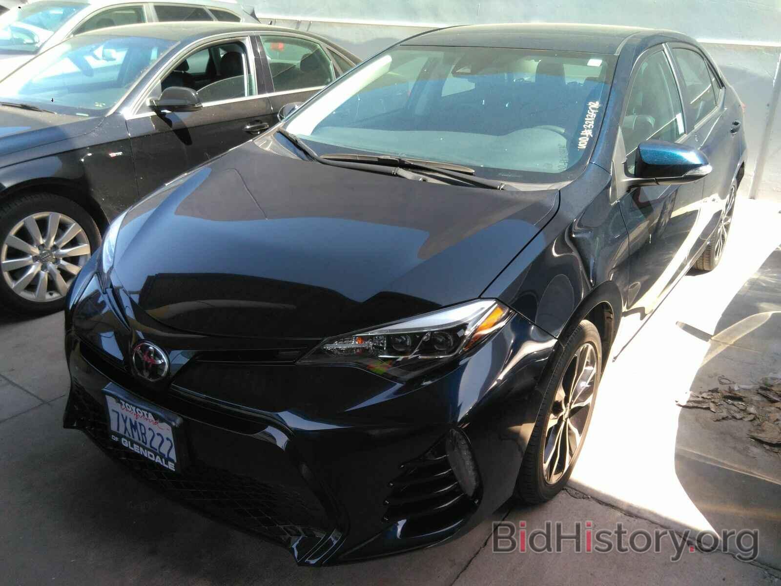 Photo 5YFBURHE1HP647509 - Toyota Corolla 2017