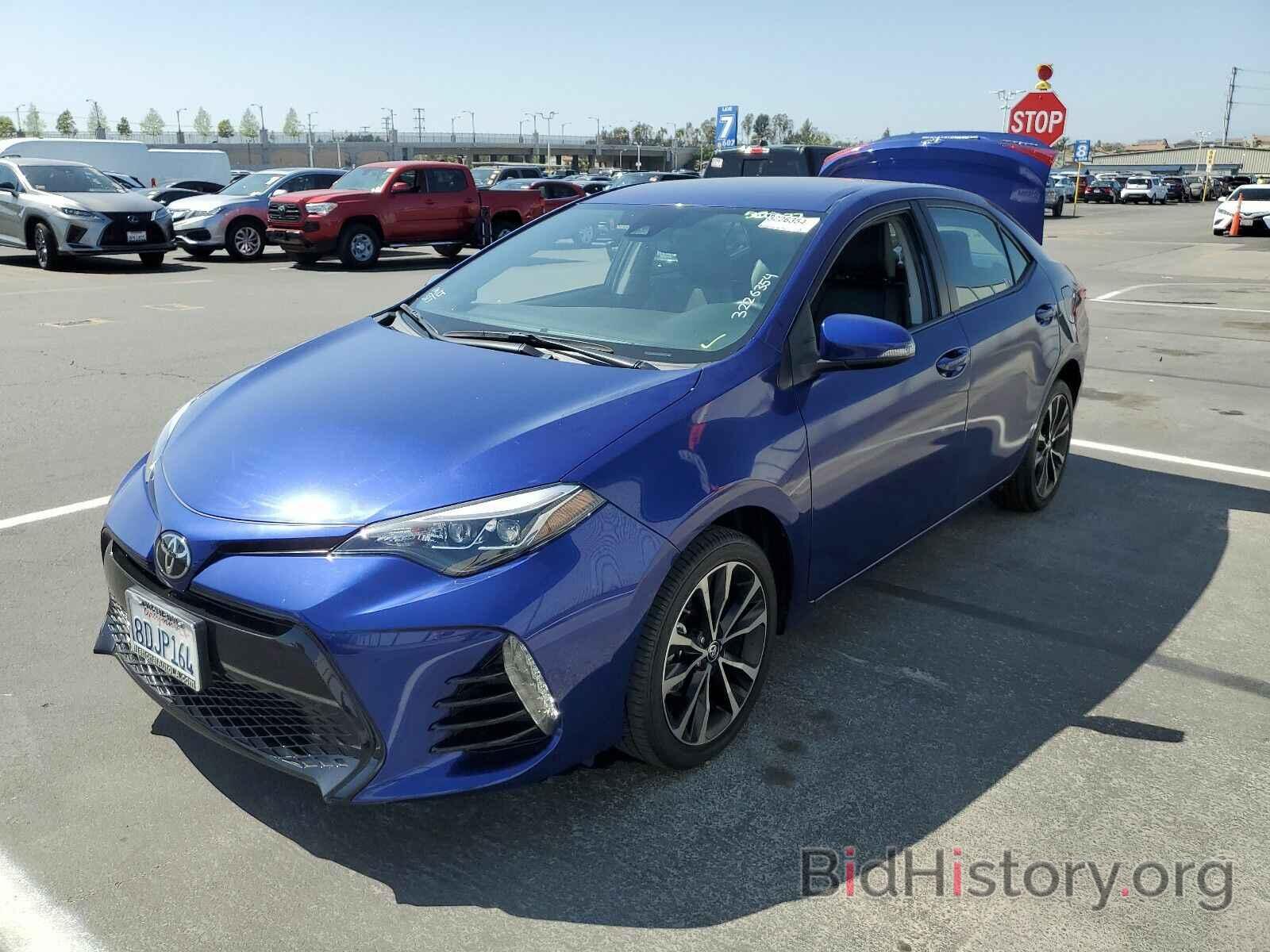 Photo 5YFBURHE1JP823187 - Toyota Corolla 2018