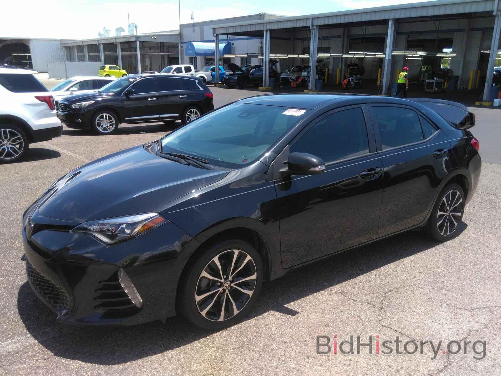 Photo 5YFBURHE0JP828929 - Toyota Corolla 2018