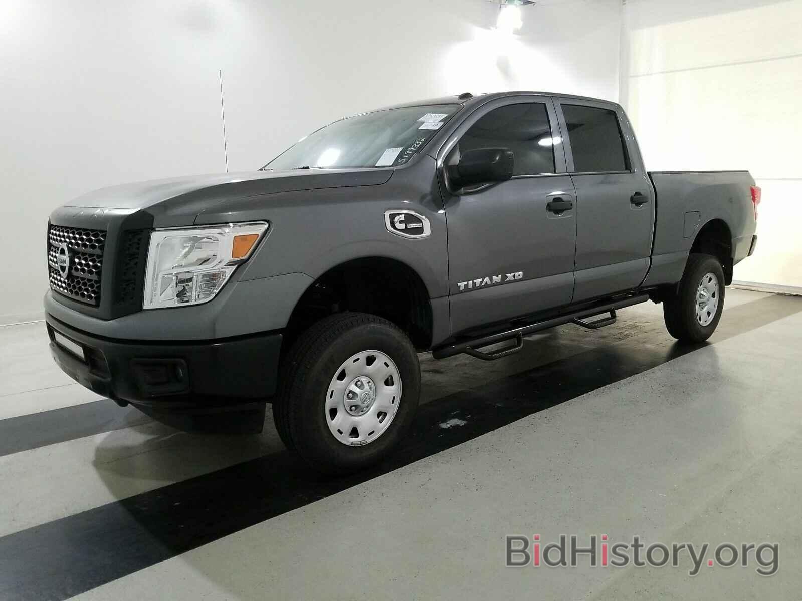 Фотография 1N6BA1F34KN506575 - Nissan Titan XD 2019