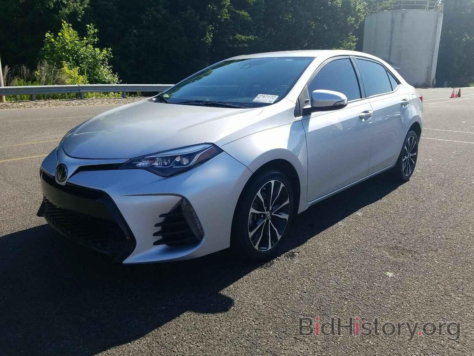 Photo 5YFBURHE1JP760916 - Toyota Corolla 2018