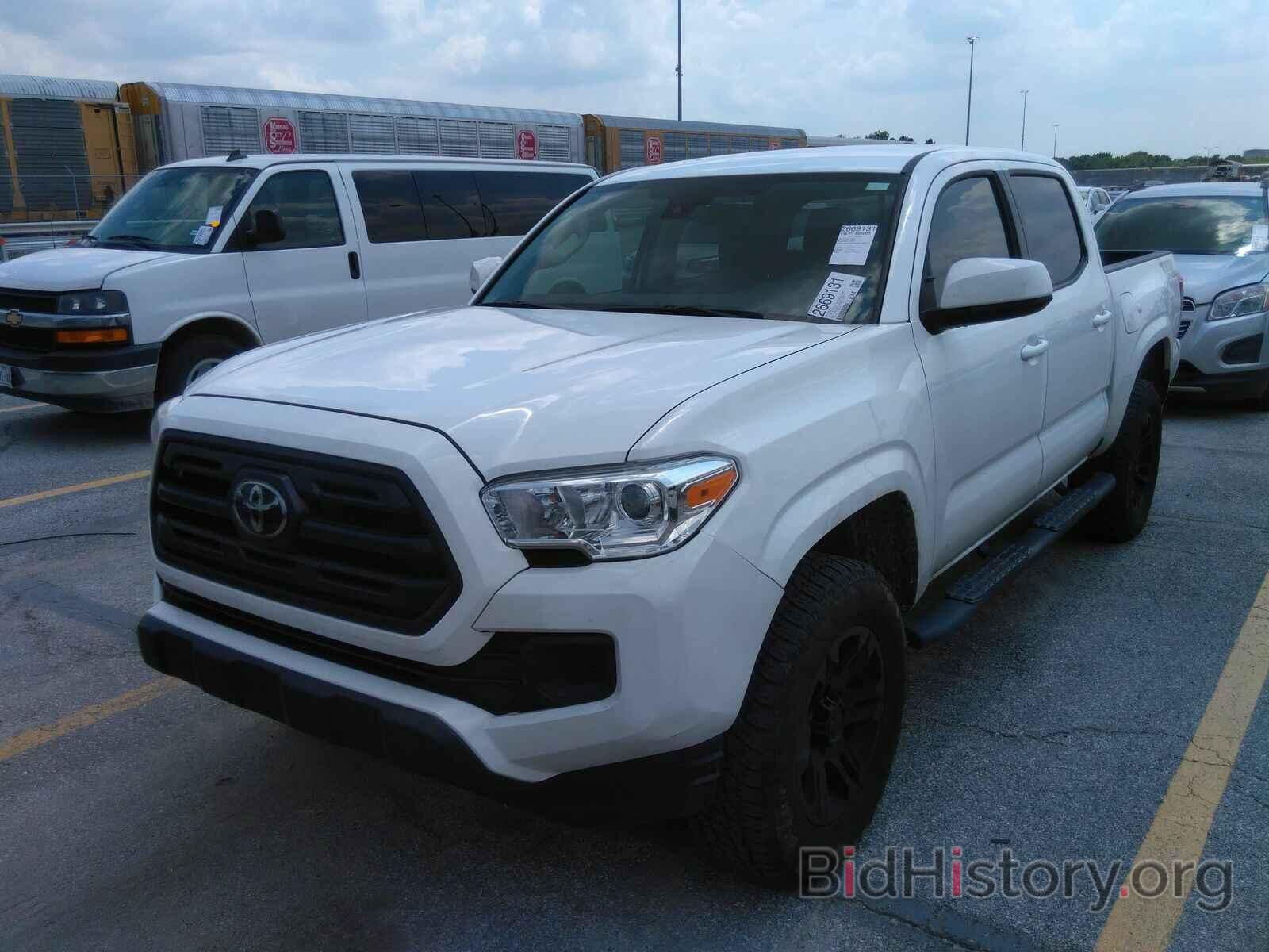 Photo 5TFAX5GN3KX137877 - Toyota Tacoma 2WD 2019