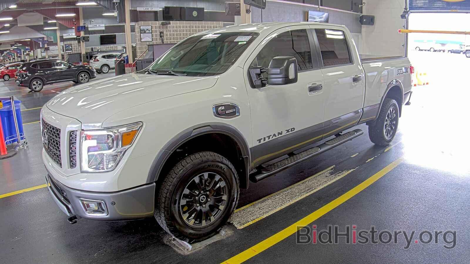 Фотография 1N6BA1F48KN519581 - Nissan Titan XD 2019