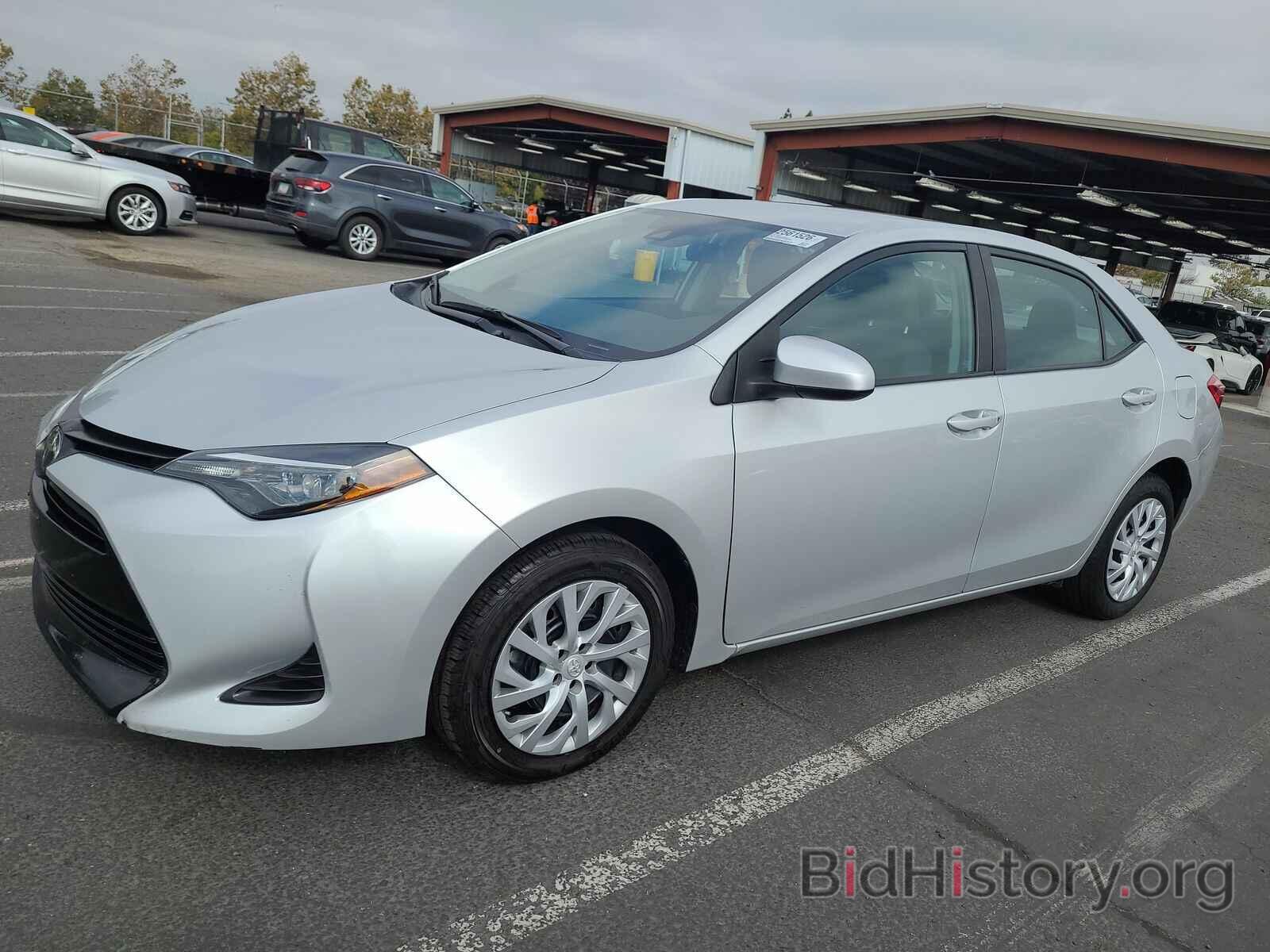 Photo 5YFBURHE6KP900184 - Toyota Corolla LE 2019