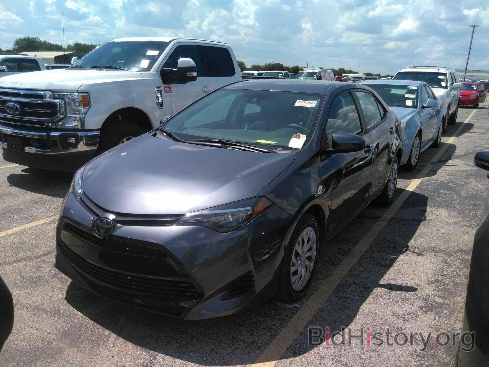 Photo 5YFBURHE9KP939268 - Toyota Corolla LE 2019