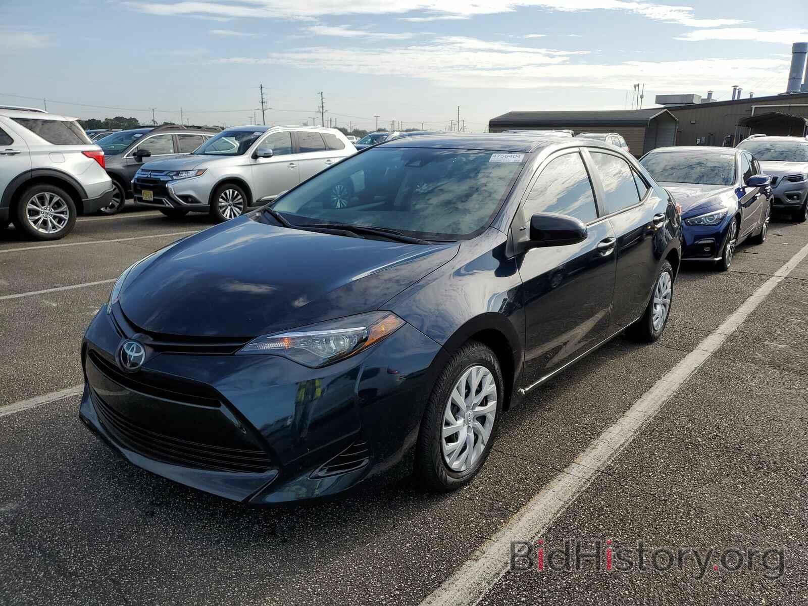 Фотография 5YFBURHE3KP877771 - Toyota Corolla LE 2019