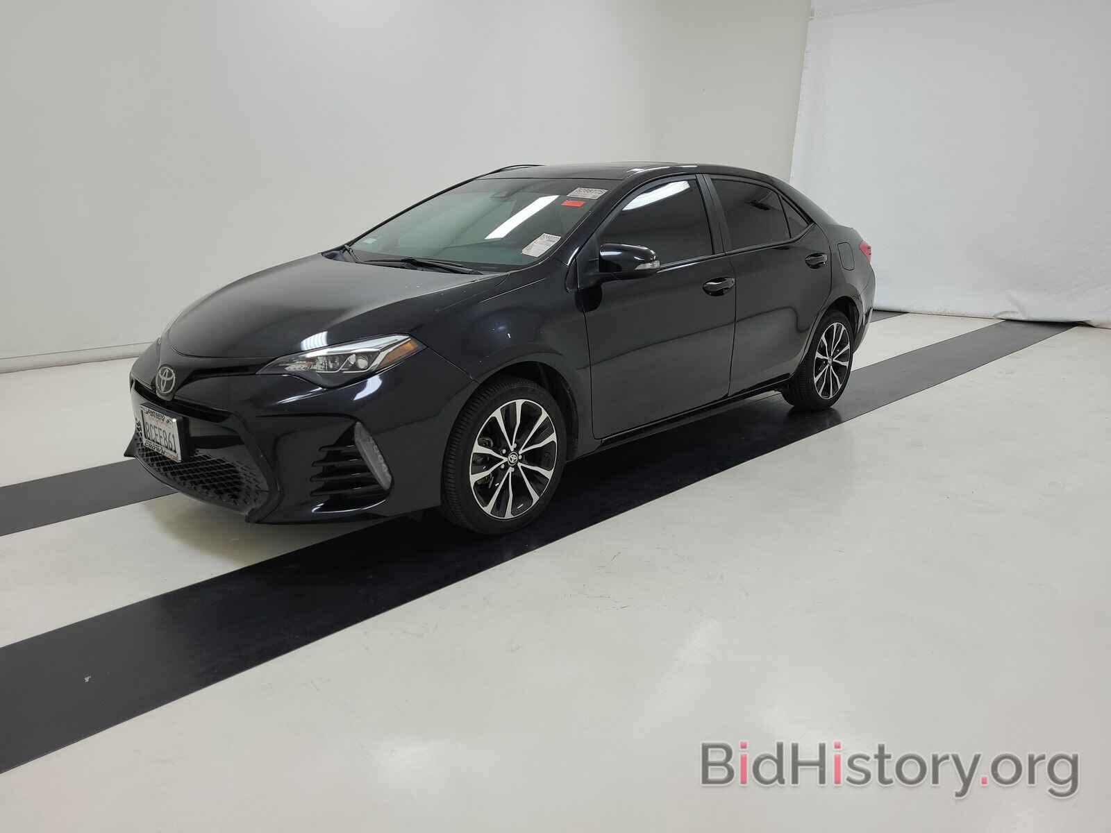 Photo 5YFBURHE1JP789980 - Toyota Corolla 2018