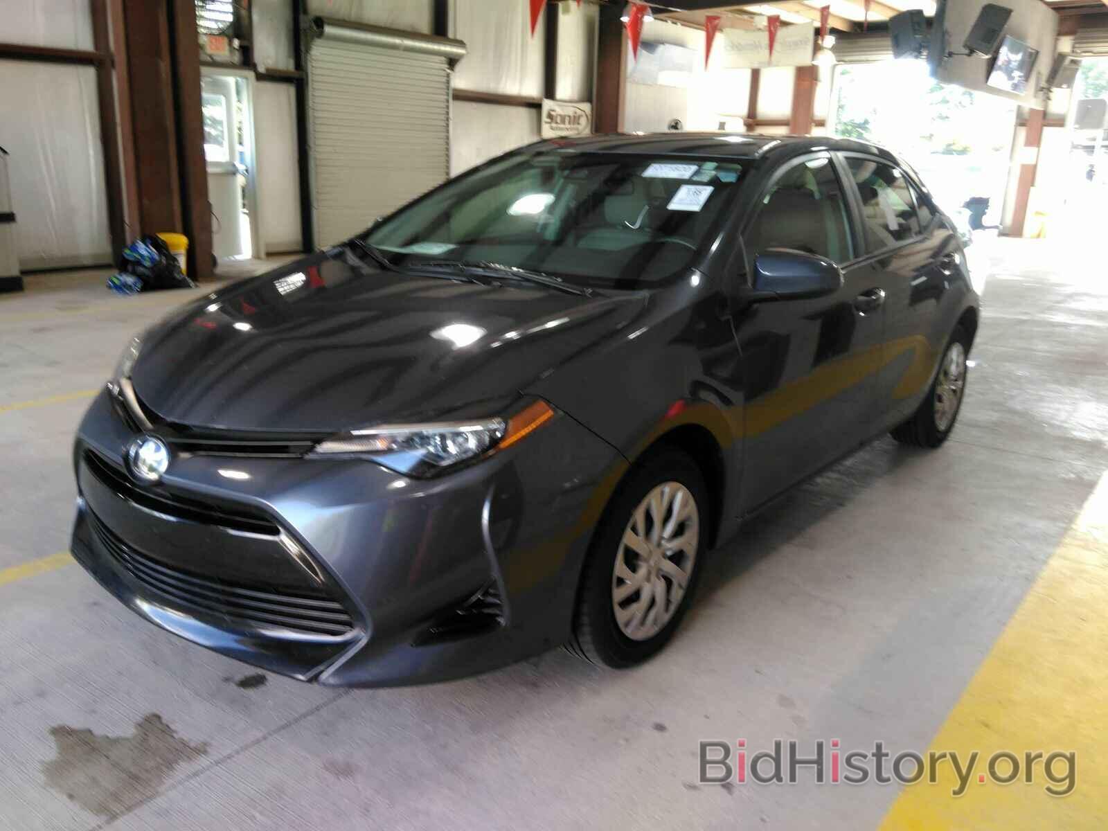 Photo 5YFBURHE3KP868861 - Toyota Corolla LE 2019