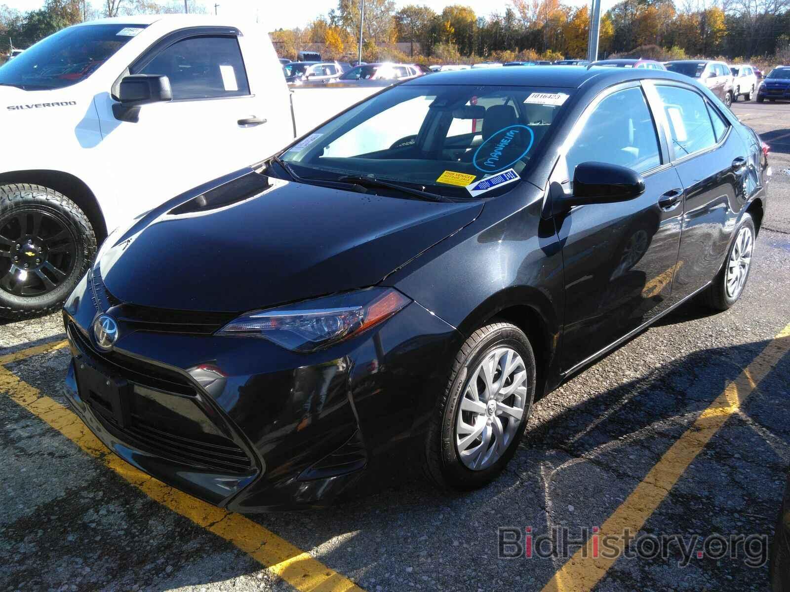 Photo 5YFBURHE8KP914104 - Toyota Corolla LE 2019